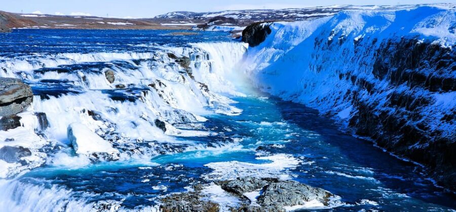 Golden Circle Private Tour from Keflavik or Reykjavik - Kerid Crater: volcanic reds and aquamarine water photos