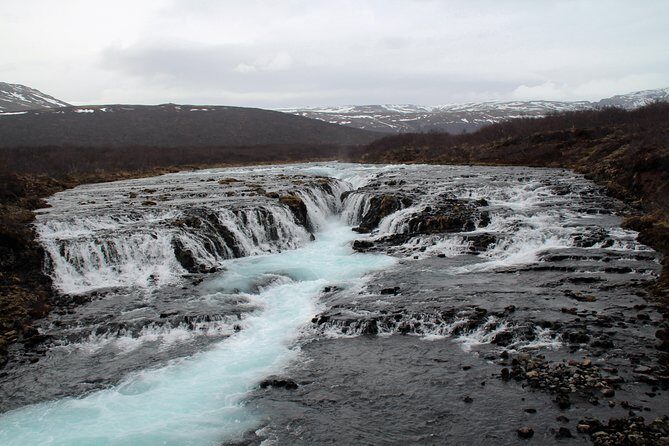 Golden Circle Tour - Secret Lagoon at Gamla Laugin: steam, hot water, and a geysir beside you